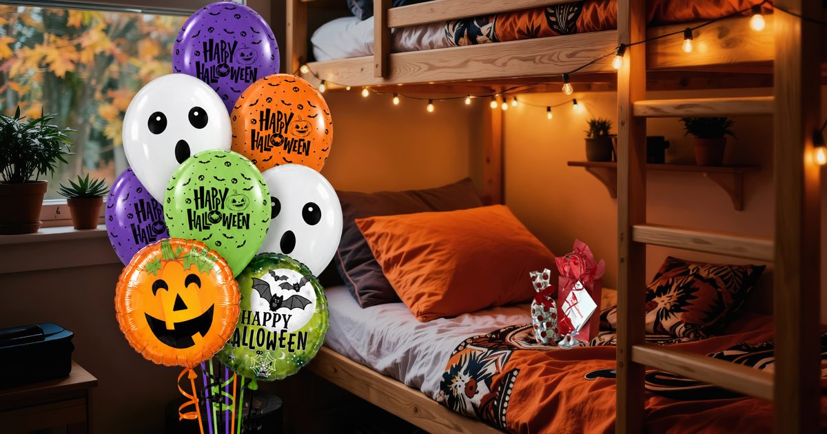 Halloween balloon bouquet beside a bunk bed in a dorm room with string lights